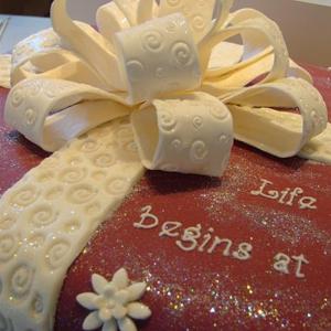 White bow celebration cake