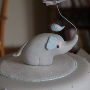 Sugar elephant and bird christening cake
