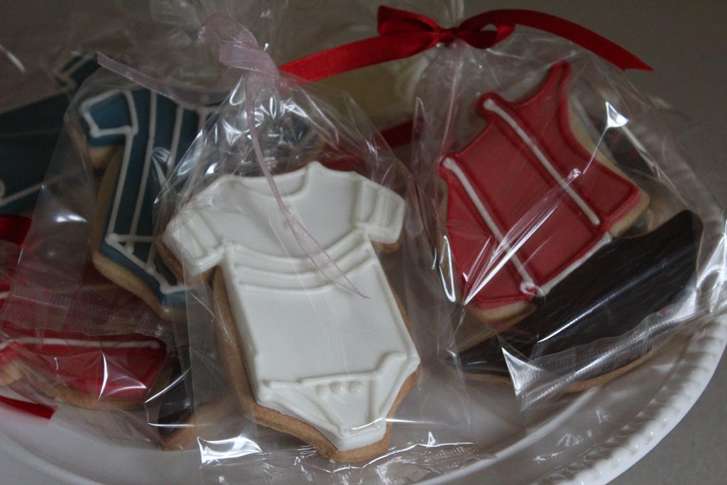 Red and white baby grow cookies