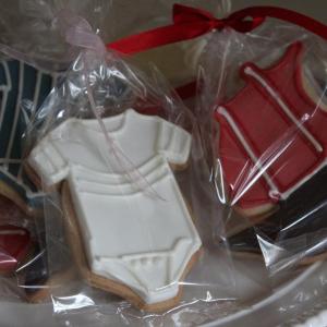 Red and white baby grow cookies