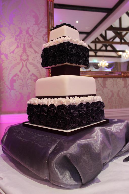 Deep purple ruffle wedding cake