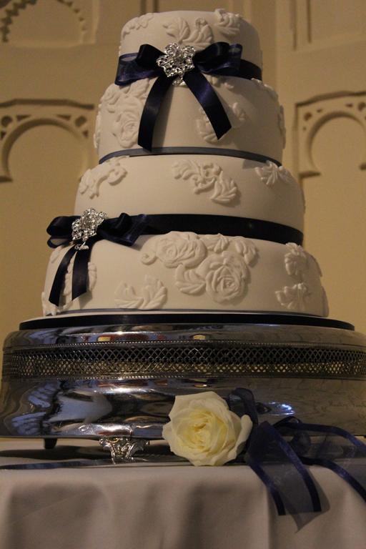 Navy and white lace wedding cake