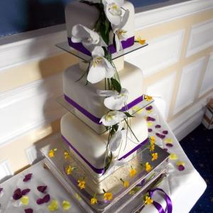 Fresh orchid wedding cake