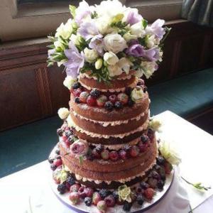 Naked berry wedding cake