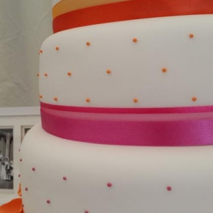 Orange and pink wedding cake